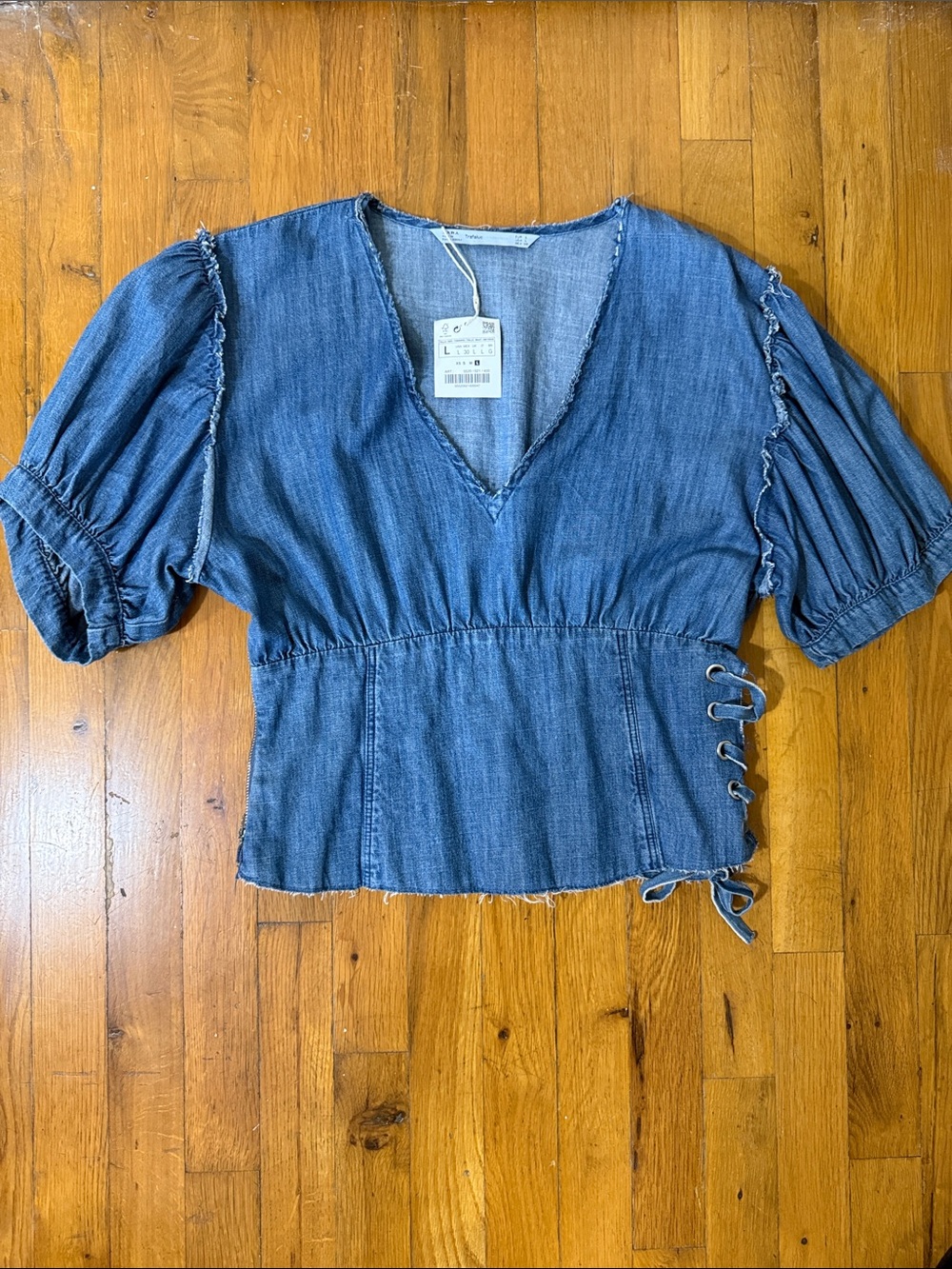 NWT Zara Lightweight Denim Top. One side has a zipper the other has a lace-up.